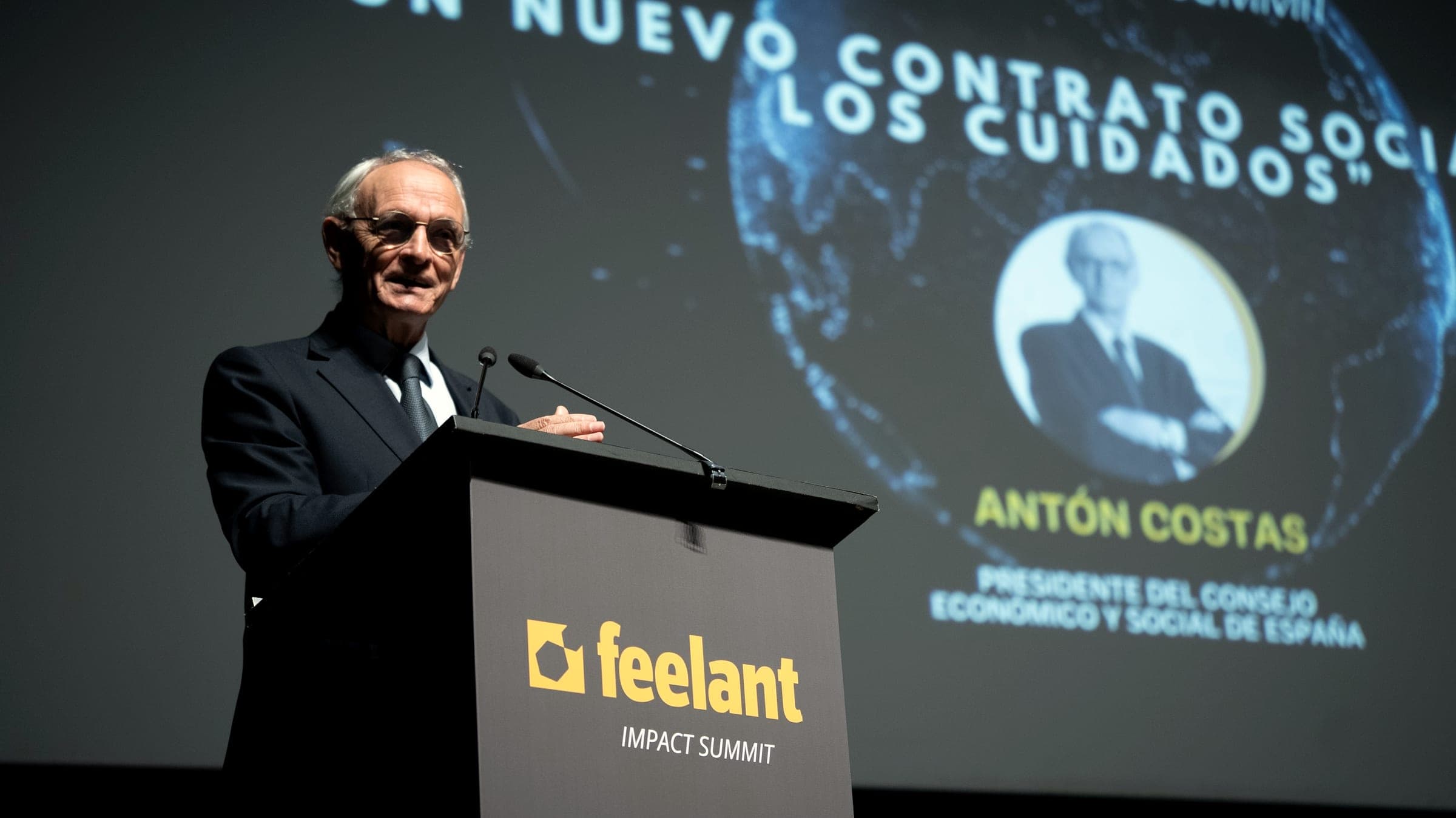 Antón Costas, president of Spain's Economic and Social Council, at the Feelant Impact Summit lectern